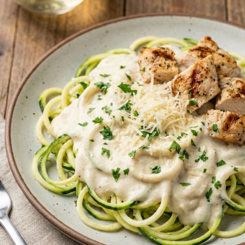 Keto Chicken Alfredo With Zucchini Noodles A Cozy Low Carb Dinner Idea Your Taste Buds Will Love. Close Up Plate Realistic Photo