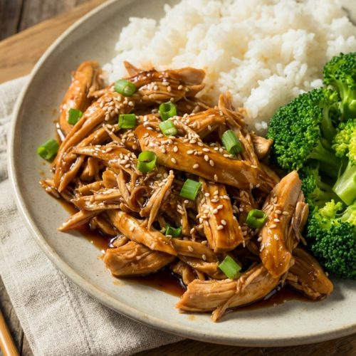 Slow Cooker Chicken Teriyaki A Cozy Weeknight Favorite With Easy Family Friendly Flavor. Close Up Plate Realistic Photo